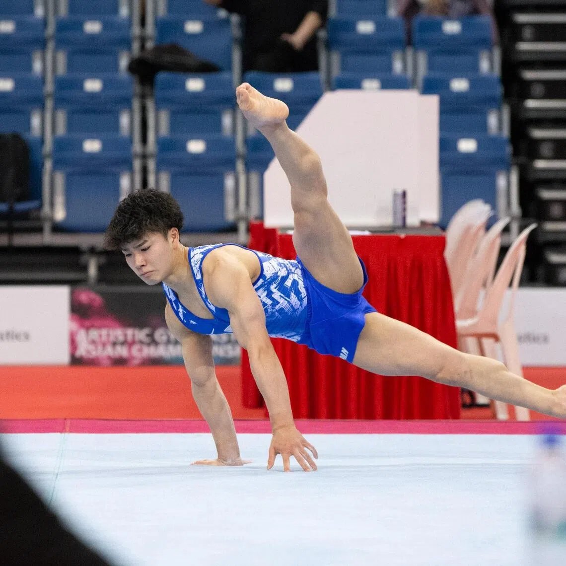 Japanese gymnast Shinnosuke Oka in the floor exercise at the Asian Artistic Gymnastics Championships in June 2023, when he won the men’s individual all-around title.