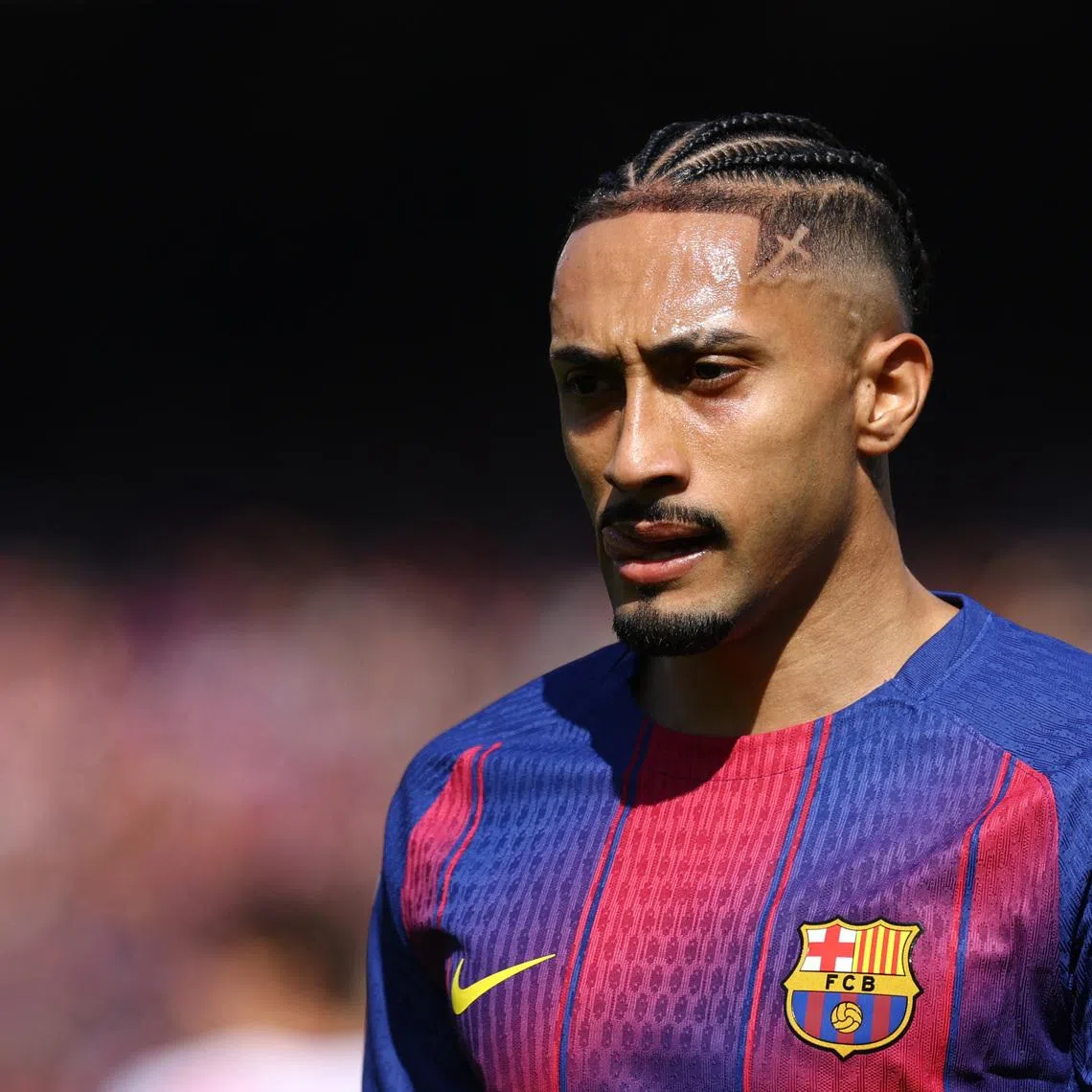 Soccer Football - LaLiga - FC Barcelona v Rayo Vallecano - Spotify Camp Nou, Barcelona, Spain - March 22, 2026 FC Barcelona's Raphinha reacts REUTERS/Albert Gea