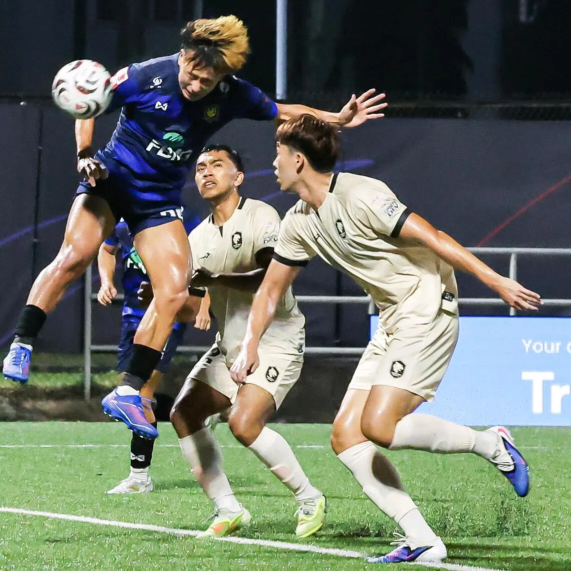 Tampines Rovers forward Hide Higashikawa (left) heading home his team’s opening goal during their Singapore Premier League match against Tanjong Pagar United at Jurong East Stadium on Oct 11.