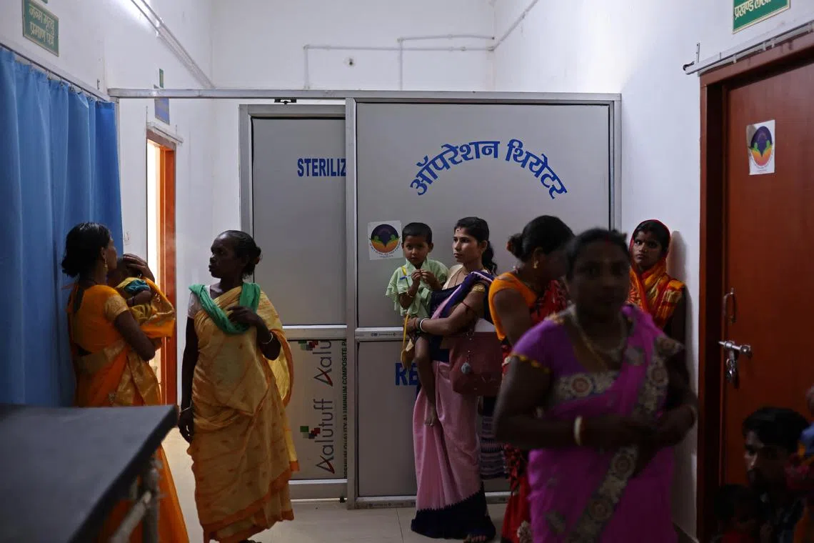 Women waiting outside the operation theatre of a community health centre on March 21. "The state government's focus is to ensure that policy interventions percolate to the ground, its mechanisms such as free sterilisation, temporary birth control instruments are used actively," said Sanjay Kumar Pansari, director in the Bihar government's Directorate of Economics and Statistics. 
