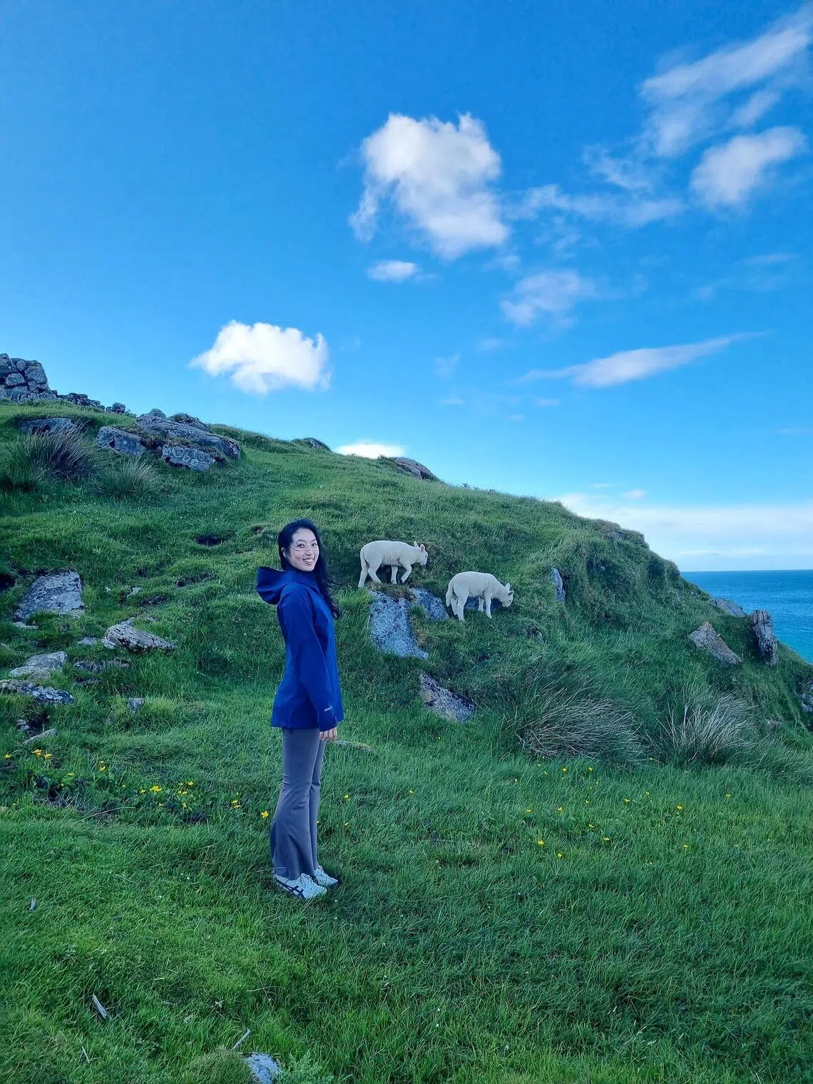 Zi Xin Owyong wearing outdoor brand Berghaus on a hike at the Isle of Skye in Scotland.