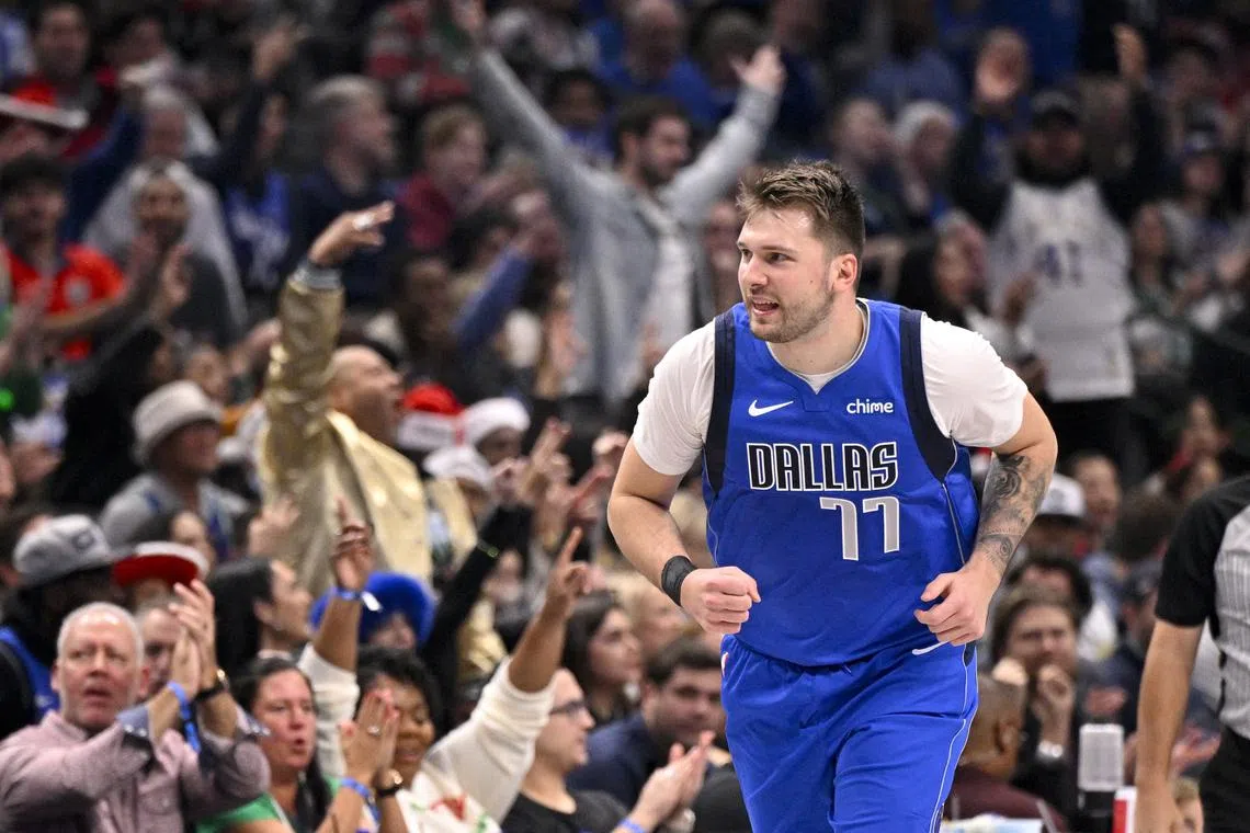 Dec 25, 2024; Dallas, Texas, USA; Dallas Mavericks guard Luka Doncic (77) celebrates after making a basket against the Minnesota Timberwolves during the first quarter at the American Airlines Center. Mandatory Credit: Jerome Miron-Imagn Images/ File Photo