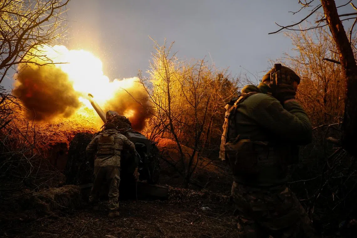 Ukrainian servicemen of the 126th Separate Territorial Defence Brigade fire a D-30 howitzer towards Russian troops at a position in a front line, amid Russia's attack on Ukraine, in Kherson region, Ukraine March 12, 2024. Radio Free Europe/Radio Liberty/Serhii Nuzhnenko via REUTERS/File Photo