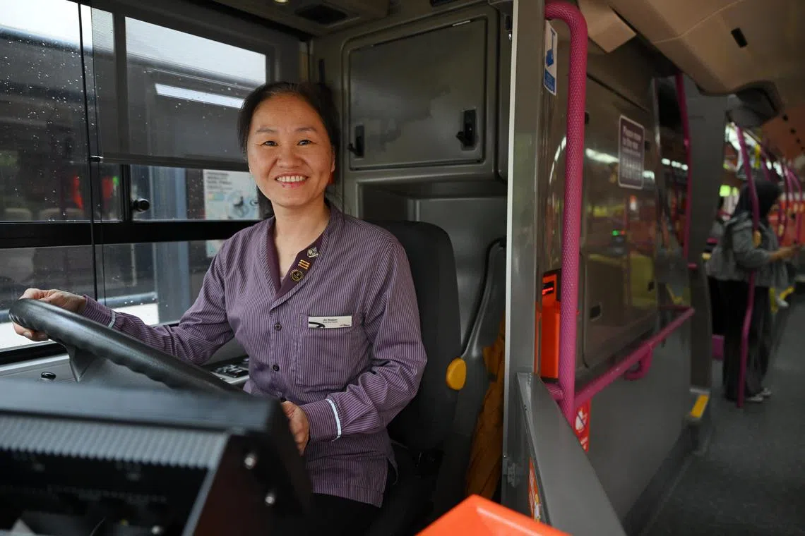 Senior Bus Captain Jin Shu Juan pictured in a bus at Clementi Bus Interchange on Nov 26, 2024.