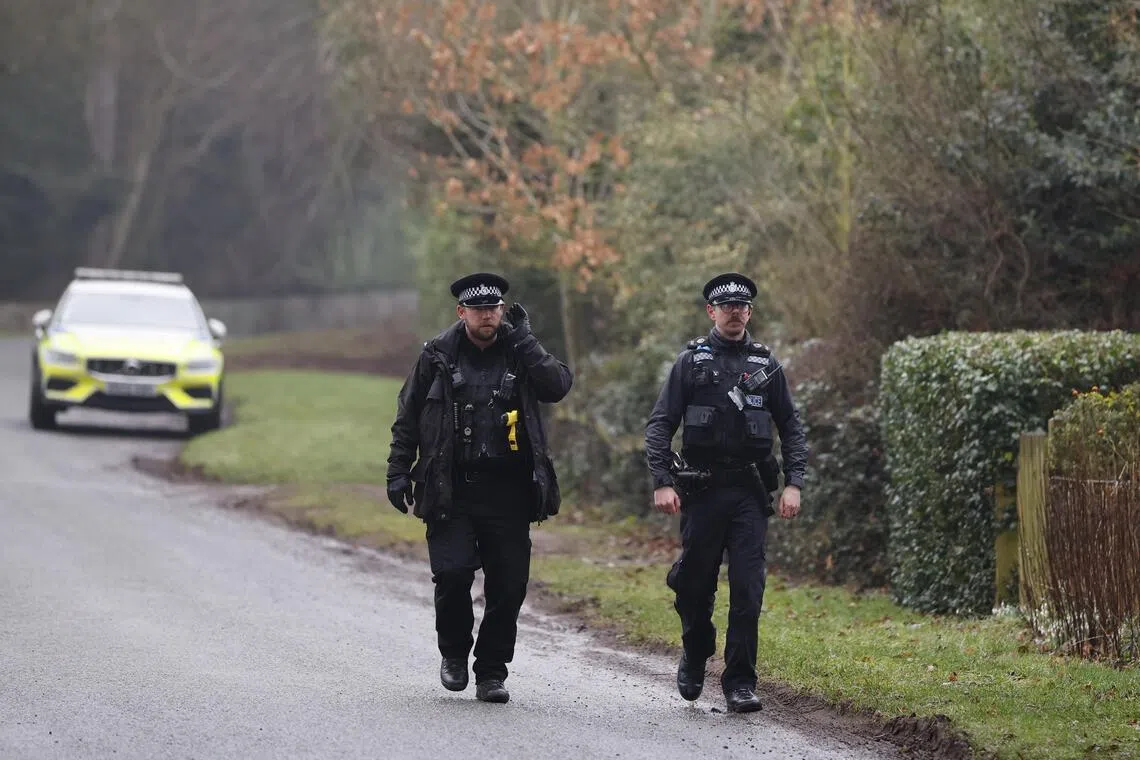 Police officers patrol the perimeter of Wood Farm where Andrew Mountbatten-Windsor was arrested in Sandringham, Norfolk, Britain, on Feb 19, 2026.