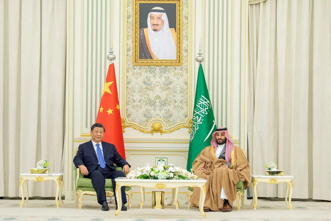 FILE PHOTO: Saudi Crown Prince Mohammed Bin Salman meets with Chinese President Xi Jinping in Riyadh, Saudi Arabia December 8, 2022. Bandar Algaloud/Courtesy of Saudi Royal Court/Handout via REUTERS/File Photo