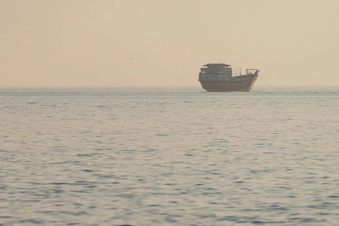 A vessel at the Strait of Hormuz, as seen from Musandam, Oman, July 28.