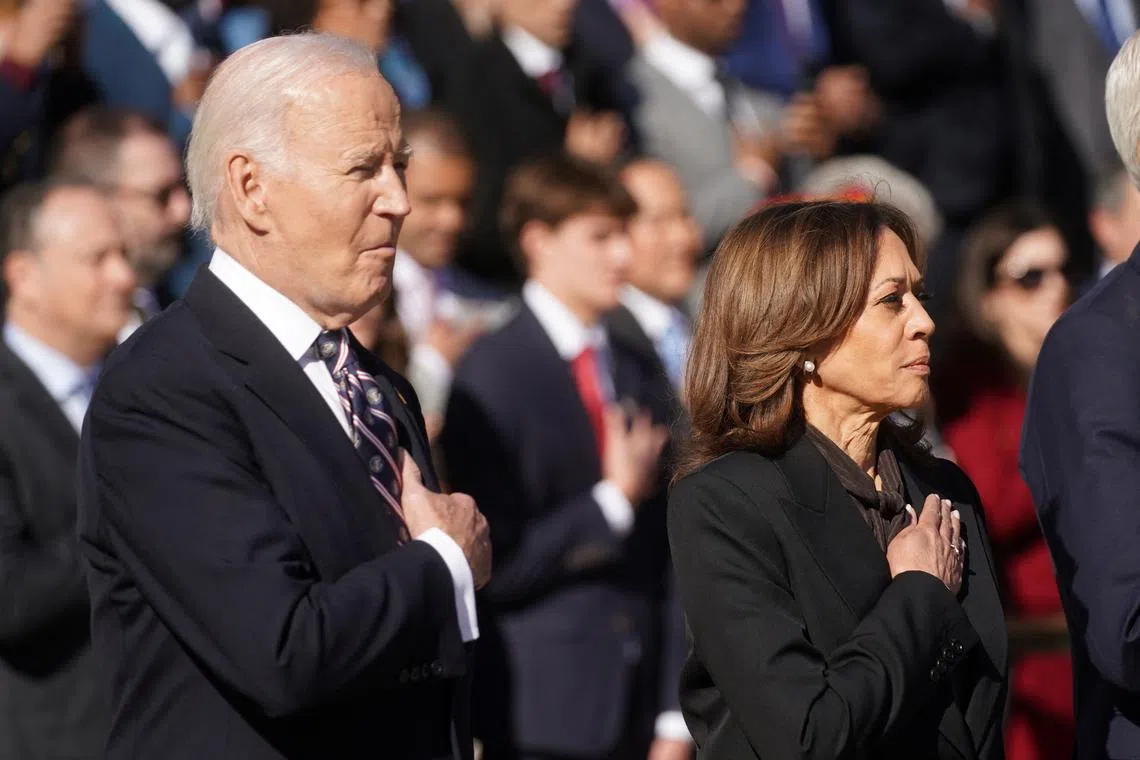 US President Joe Biden and  Vice President Kamala Harris take part in a wreath laying ceremony at the Tomb of the Unknown Soldier.