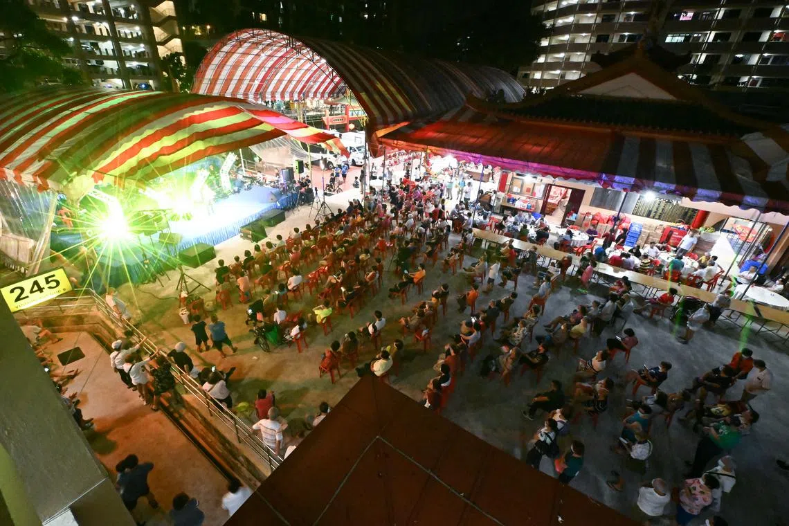 People watching the getai show at the Soon Say Keng Temple to celebrate a deity’s birthday on July 15, 2022. 