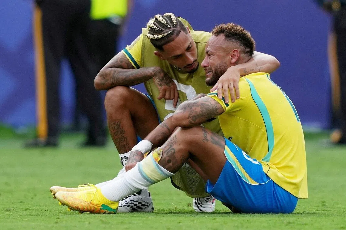Raphinha (left) consoling Neymar after Brazil’s World Cup last-16 exit, following a 2-1 loss to Norway at MetLife Stadium in East Rutherford, New Jersey, on July 5, 2026.
