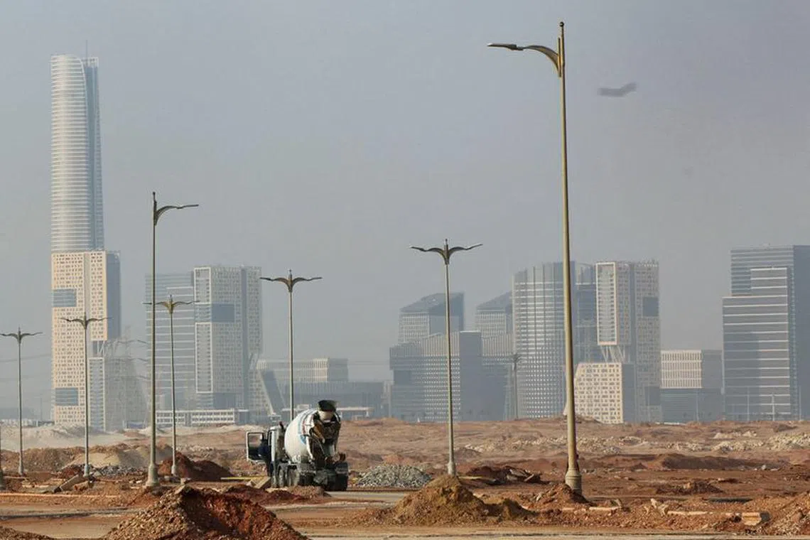 An Egyptian worker drives a construction truck on the road at the New Administrative Capital (NAC) in the desert east of Cairo, Egypt December 8, 2023. REUTERS/Amr Abdallah Dalsh/File Photo