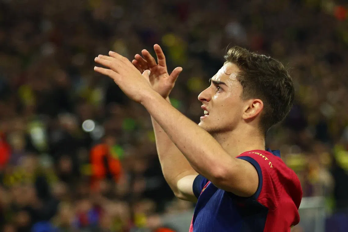 Soccer Football - Champions League - Quarter Final - Second Leg - Borussia Dortmund v FC Barcelona - Signal Iduna Park, Dortmund, Germany - April 15, 2025 FC Barcelona's Gavi celebrates their first goal, an own goal scored by Borussia Dortmund's Ramy Bensebaini REUTERS/Thilo Schmuelgen/File Photo