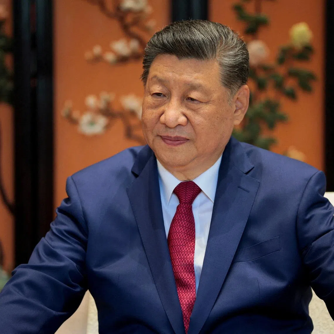 FILE PHOTO: Chinese President Xi Jinping looks on during a meeting with U.S. President Donald Trump (not pictured) on the sidelines of their visit to the Zhongnanhai Garden in Beijing, China, May 15, 2026. REUTERS/Evan Vucci/Pool/File Photo
