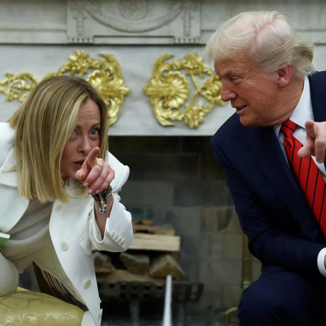 FILE PHOTO: U.S. President Donald Trump meets with Italian Prime Minister Giorgia Meloni in the Oval Office at the White House in Washington, D.C., U.S., April 17, 2025. REUTERS/Evelyn Hockstein/File Photo