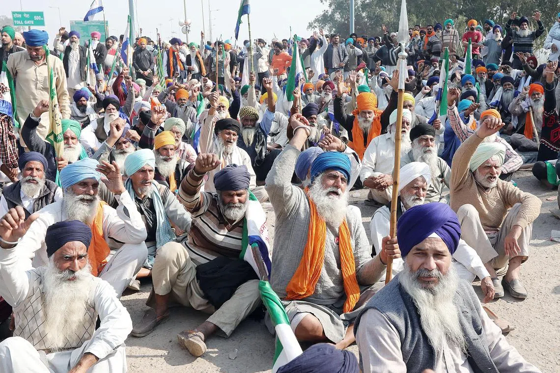 epa11155199 Anti-riot police deployed to prevent Punjabi farmers from reaching Delhi, during the third day of ‘Delhi Chalo' (On to Delhi!) farmers protest at the Haryana-Punjab border point in Shambhu, 250 kilometers north of Delhi, India, 15 February 2024. The farmers from several farmer associations mainly from Uttar Pradesh, Haryana and Punjab march to Delhi from the Ambala-Shambhu, Khanauri-Jind border points, as part of a protest demanding a law guaranteeing minimum support price (MSP) for their produce.  EPA-EFE/HARISH TYAGI