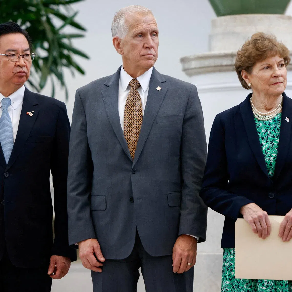 Taiwan's National Security Council Secretary-General Joseph Wu, U.S. Senators Thom Tillis (R-NC) and Jeanne Shaheen (D-NH) attend a press conference at the Presidential Office Building in Taipei, Taiwan, March 30, 2026. REUTERS/Ann Wang
