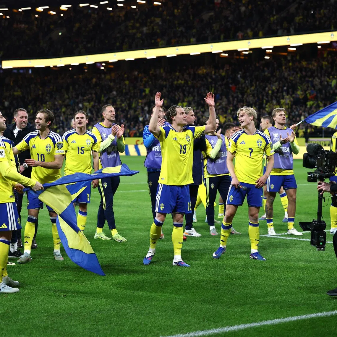 Soccer Football - FIFA World Cup - UEFA Qualifiers - Finals - Sweden v Poland - Strawberry Arena, Solna, Sweden - March 31, 2026 Sweden players celebrate qualifying for the FIFA World Cup REUTERS/Kacper Pempel