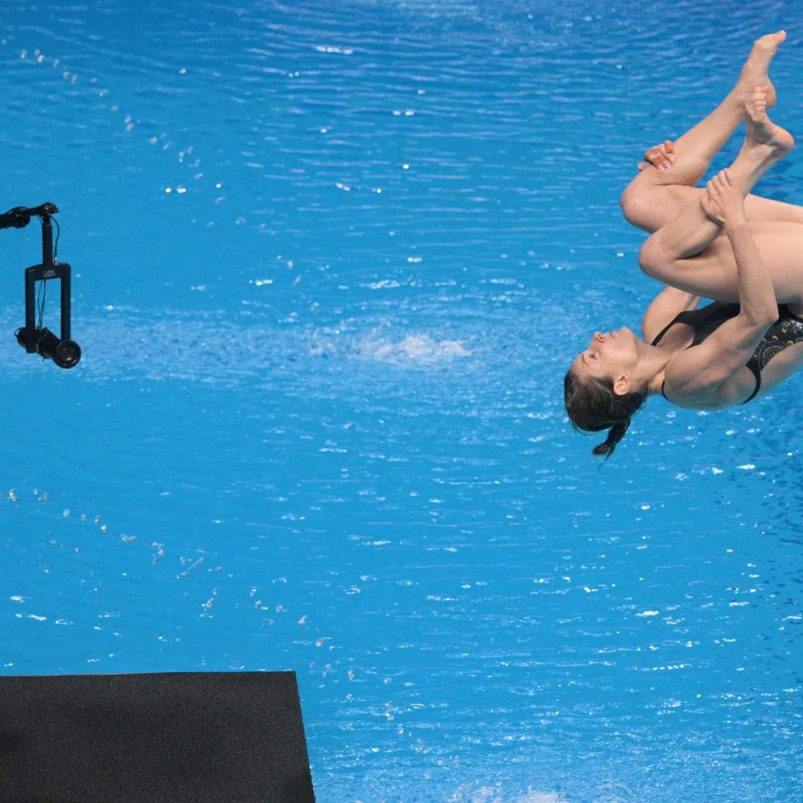 Maddison Keeney diving her way to gold in the women's 1m springboard final at the World Aquatics Championships in Singapore on July 26.