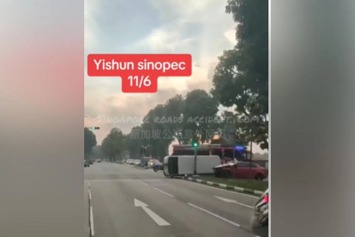 Photos of the aftermath show a white van turned on its side and a red car besides it.