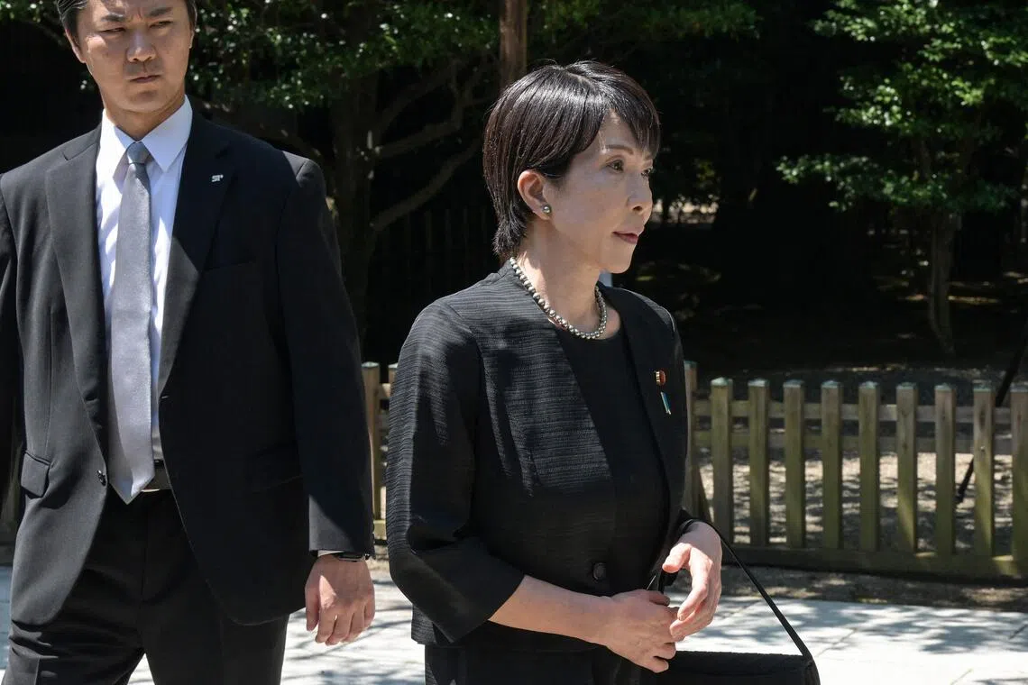 Sanae Takaichi (R) of Japan's Liberal Democratic Party (LDP) leaves following a visit to Yasukuni Shrine in Tokyo on August 15, 2025, on the 80th anniversary of Japan's surrender in World War II. (Photo by Richard A. Brooks / AFP)