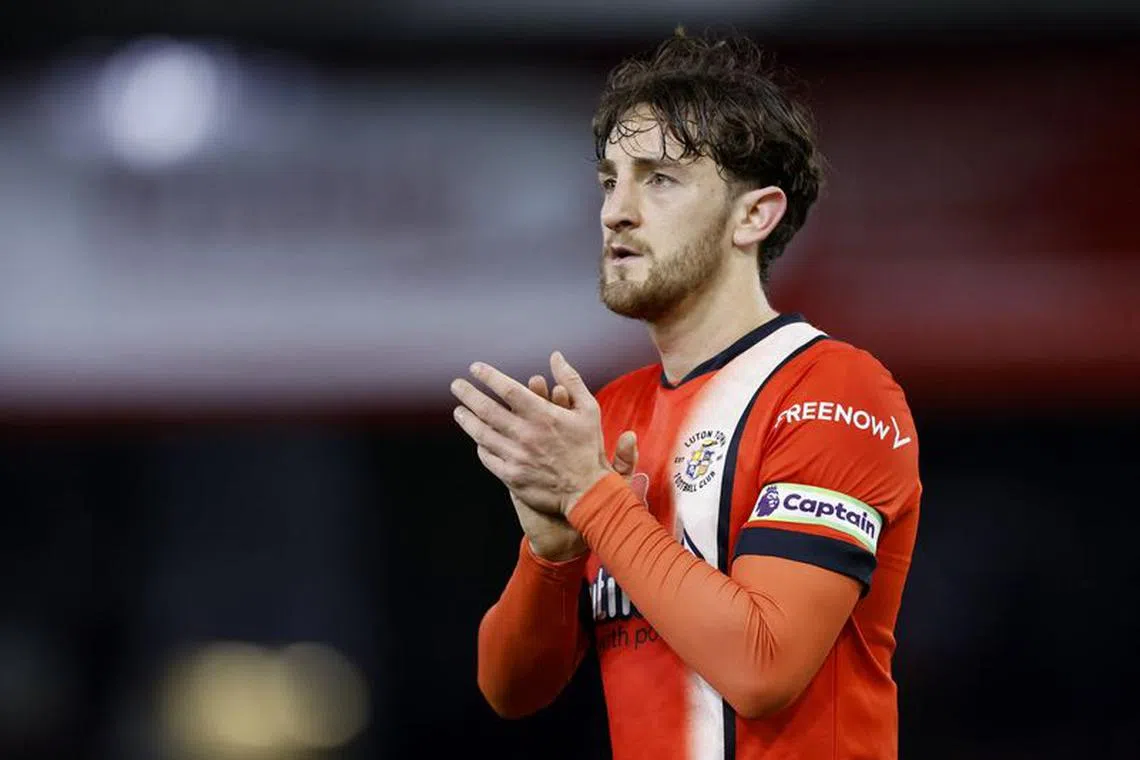 Soccer Football - Premier League - Luton Town v Liverpool - Kenilworth Road, Luton, Britain - November 5, 2023  Luton Town's Tom Lockyer applauds fans after the match Action Images via Reuters/Peter Cziborra/File Photo