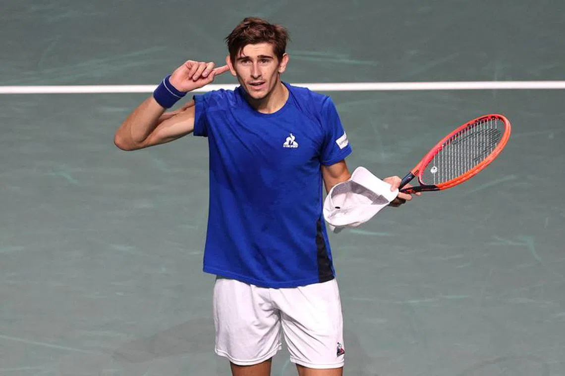 FILE PHOTO: Tennis - Davis Cup - Final - Australia v Italy - Palacio de deportes Martin Carpena, Malaga, Spain - November 26, 2023 Italy's Matteo Arnaldi celebrates after winning his singles match against Australia's Alexei Popyrin REUTERS/Violeta Santos Moura/File Photo