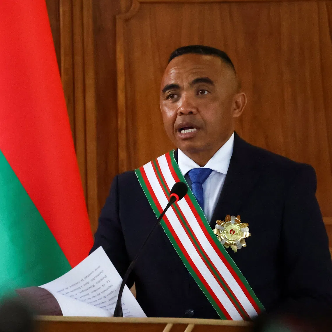 Madagascar's new military ruler, Colonel Michael Randrianirina, speaks after being sworn in as president on Friday taking over from Andry Rajoelina following a coup that ousted him, at the constitutional court in Antanariv , Madagascar, October 17, 2025. REUTERS/Siphiwe Sibeko