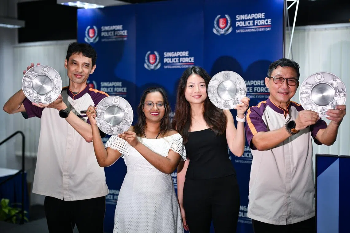 ST20260430-202615300442-Lim Yaohui-Justine Ong Min Si-joaward30/ Ms Tan Li Nian, (third from left) 32, KYC analyst and Ms Yasodhaa Balakrishnan, (second from left) 39, Assistant Manager with their SaferSG Public Spiritedness Awards together with SBS Transit Rail staff, Mr Jansen Heng, (extreme left) 51, Customer Service Officer and Mr Desmond Dexter John, (extreme right) 64, Assistant Station Manager, with their SaferSG Partner (Individual) Awards, during the award ceremony for the Public Spiritedness Award (PSA) and Community Partnership Award (CPA) by Public Transport Security Command  (TransCom) at Transcom HQ on April 30, 2026.   During the ceremony, two members of the public will receive the PSA and six public transport staff from SMRT Corporation and Tower Transit Singapore will receive the CPA. In addition, one member of the public will be receiving a letter of appreciation. The recipients had assisted in separate cases relating to molestation, voyeurism, and public nuisance. The award recipients demonstrated bravery and civic mindedness, their public spiritedness, and their strong community partnership with the Police. Their actions played a crucial role in detecting and preventing crimes. (ST PHOTO: LIM YAOHUI)