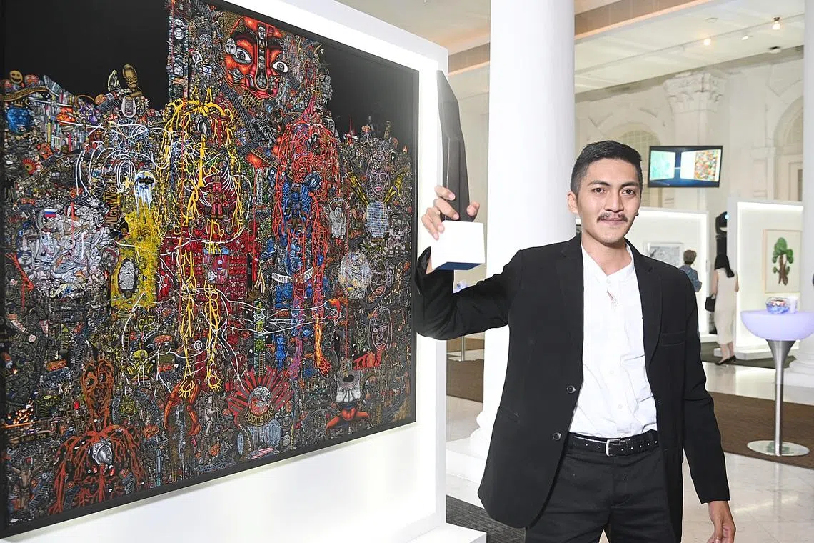 Mr Chomrawi Suksom from Thailand , winner of 
2022 UOB Southeast Asian Painting of the Year; Established Artist Category (regional) 
Title of painting : Dystopia 
Mixed media on canvas (Acrylic, oil, drawing and gold leaf) 




The themes for this year's UOB 41st Painting of the Year awards allow artists to explore evolving social issues through their surroundings and experiences with art.
