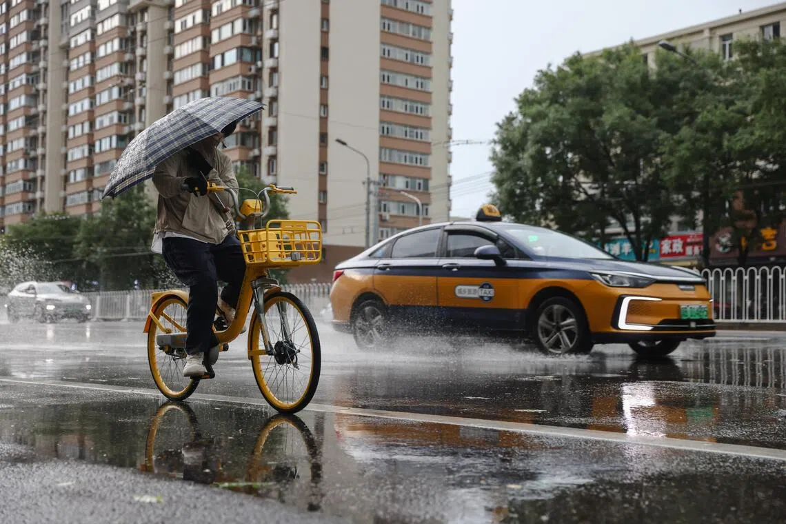 Typhoon Dolphin’s vast storm system pushes inland, threatens central China