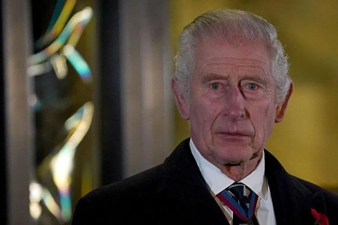 Britain's King Charles reacts after unveiling statues of Britain's Queen Elizabeth and Prince Phillip upon his and Queen Camilla arrival to attend the Royal British Legion Festival of Remembrance at the Royal Albert Hall in London, Britain, November 11, 2023. REUTERS/Maja Smiejkowska/Pool/ File photo
