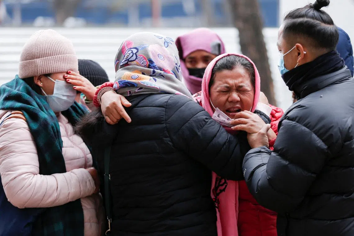 Family members mourn the death of a victim of the plane crash of a Yeti Airlines operated aircraft, in Pokhara, Nepal, Jan 16, 2023.