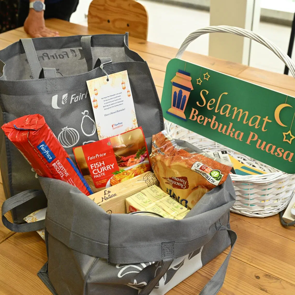 The care packs contain staples such as cereal, soy milk, tinned tuna and pitted dates.