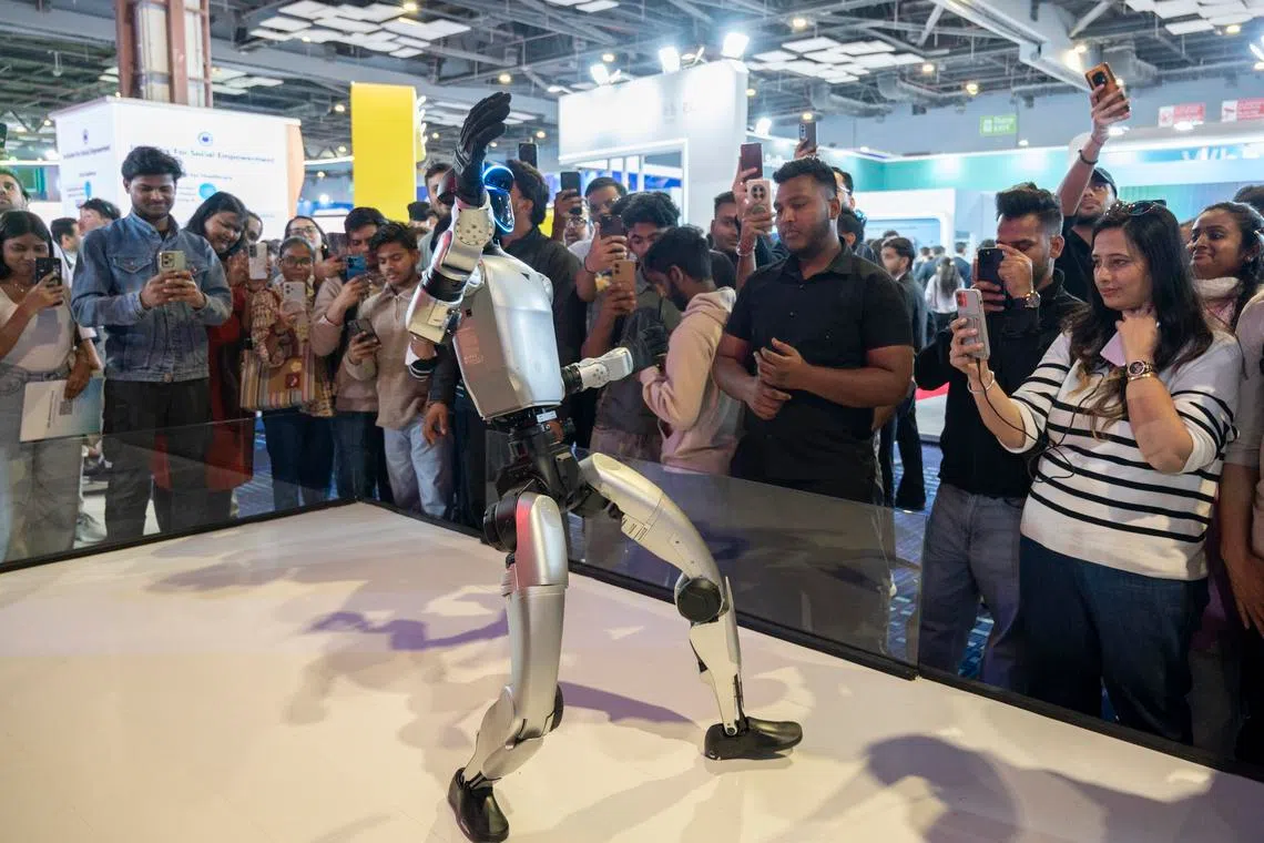 A robot on show at the pavilion of India’s telecom company Airtel at the India AI Impact Summit in New Delhi on Feb 17. 