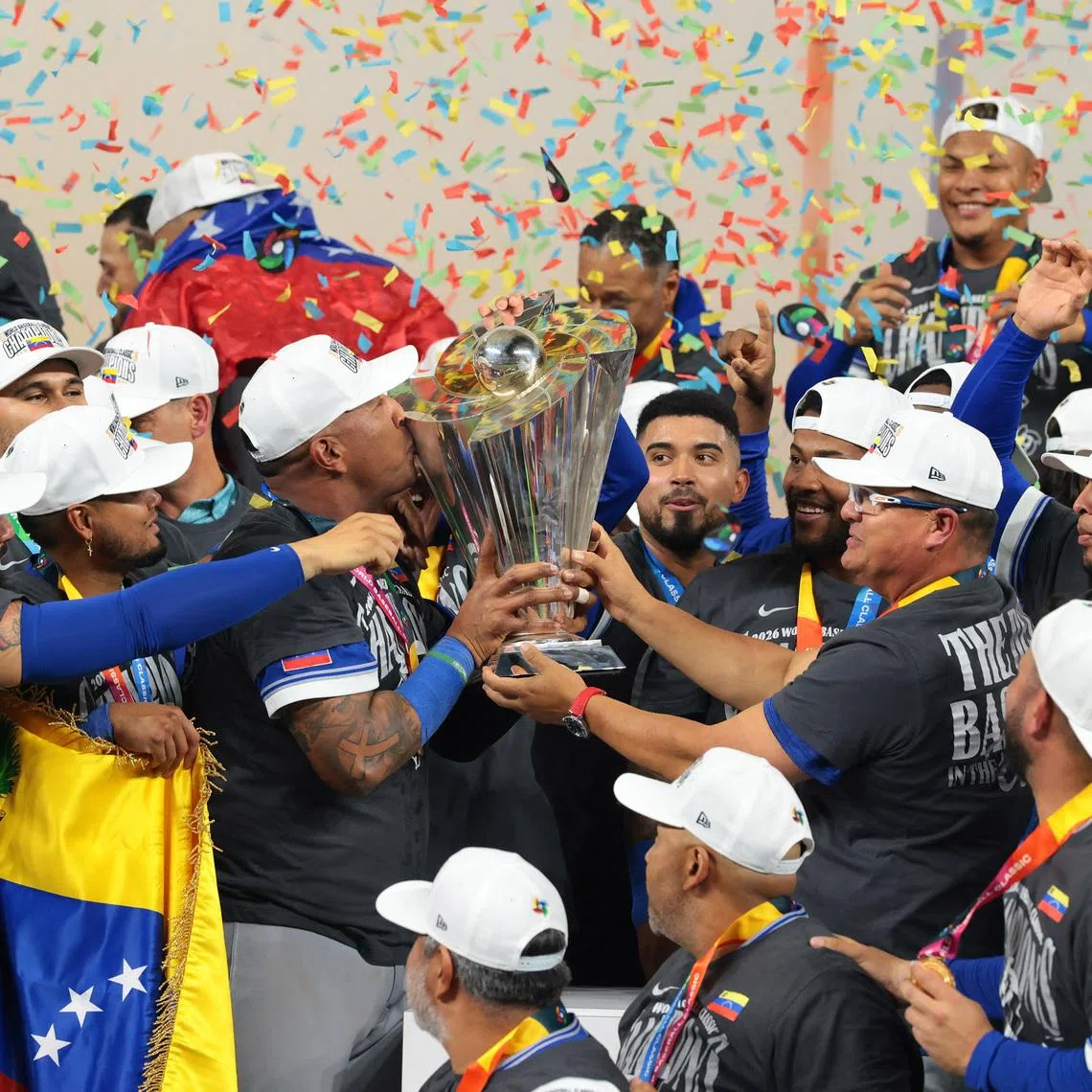 Mar 17, 2026; Miami, FL, United States; Venezuela reacts on the stage after defeating the United States during the 2026 World Baseball Classic Championship game at loanDepot Park. Mandatory Credit: Sam Navarro-Imagn Images