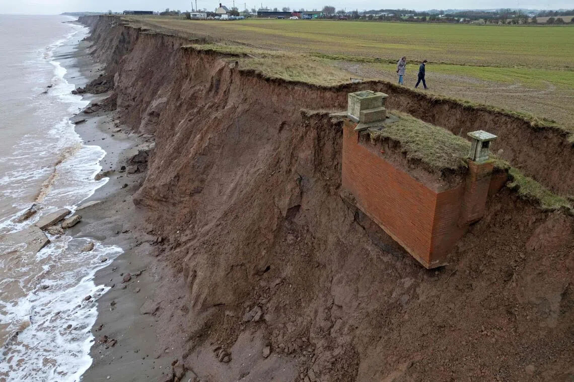A decommissioned cold war nuclear observation post partially slid away from the edge of a cliff due to coastal erosion, near Hull in north-east England, on Jan 16.