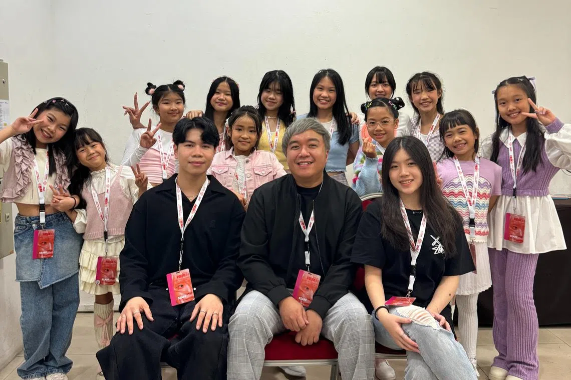 The team from local performing arts studio Maddspace in the dressing room during K-pop star IU's concert on April 21. 