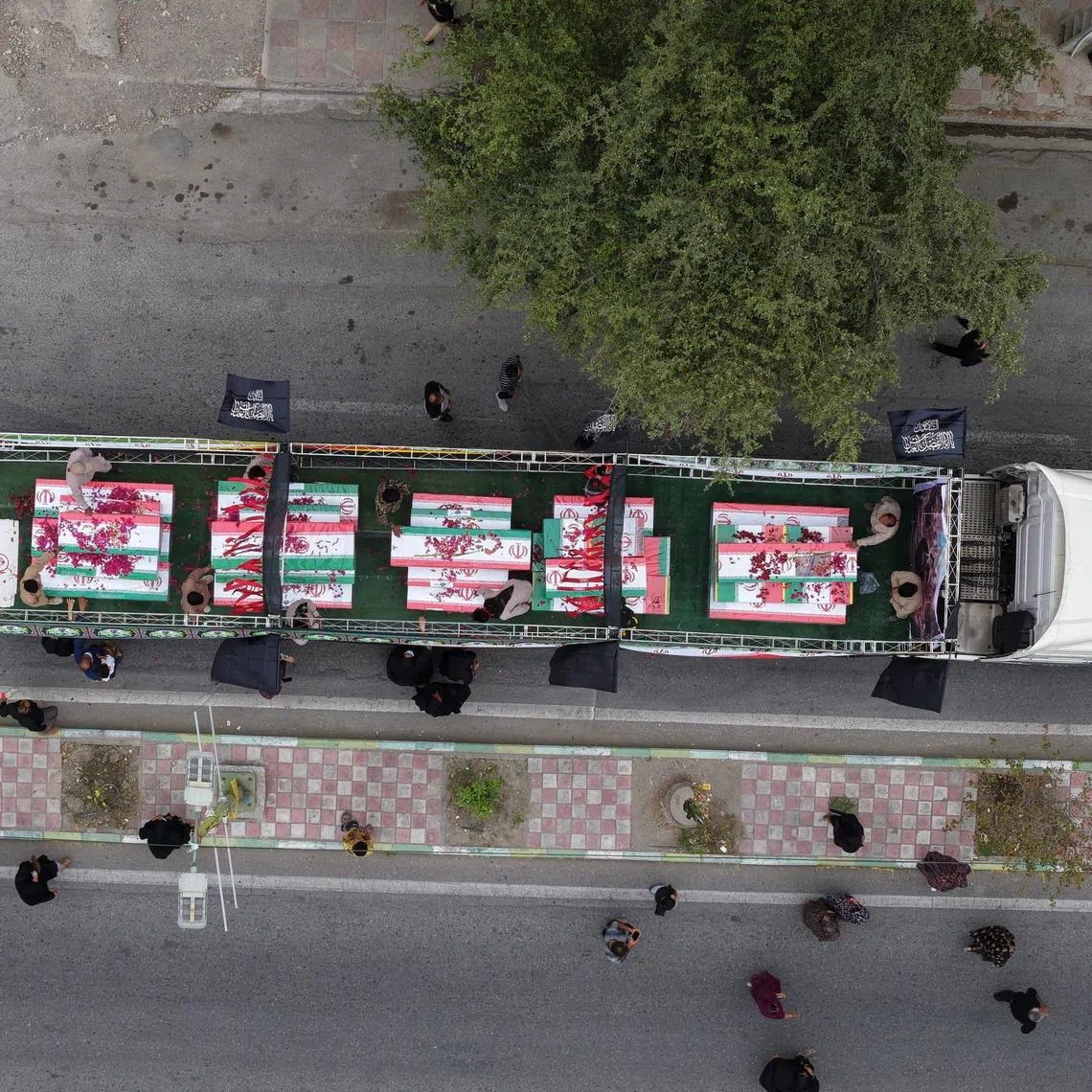 Coffins being transported before a funeral procession for the victims of astrike on a girls' school in the city of Minab, Iran, on March 3. Iran has placed the death toll at more than 150.
