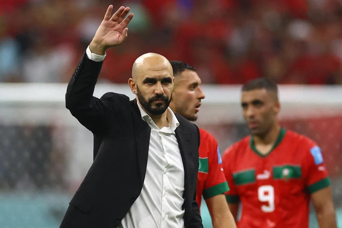 Morocco coach Walid Regragui acknowledges the fans after the semi-final match as Morocco are eliminated from the World Cup on Wednesday. 