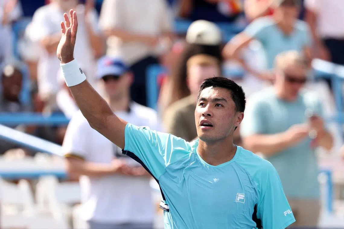 American Brandon Nakashima celebrating his win over Alex de Minaur of Australia on July 31.