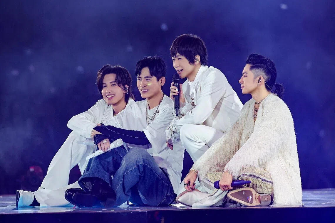 Mayday lead vocalist Ashin (second from right) with (from left) actor-singers Jerry Yan, Vic Chou and Van Ness Wu from Taiwanese drama Meteor Garden during the F*Forever 1st World Tour In Singapore concert on Aug 14.