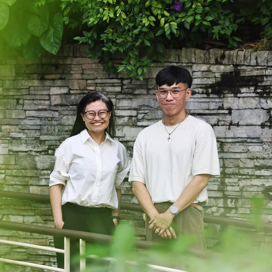 Cancer survivor Ranald Lai, who has also Li-Fraumeni syndrome - a rare genetic disorder that increases a person’s cancer risks - with his doctor, senior medical oncologist Valerie Yang.