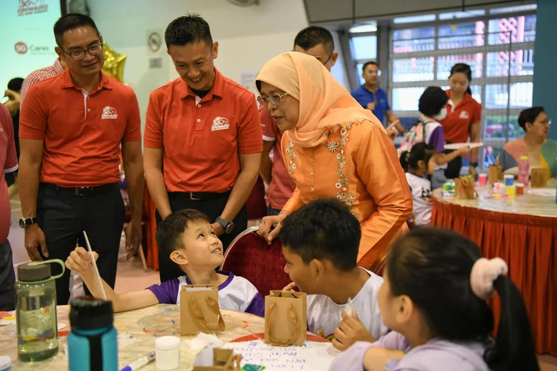 President Halimah Yacob launched the #GiveAsOneSG campaign for NDP 2023 at Chua Chu Kang Community Club on May 31.