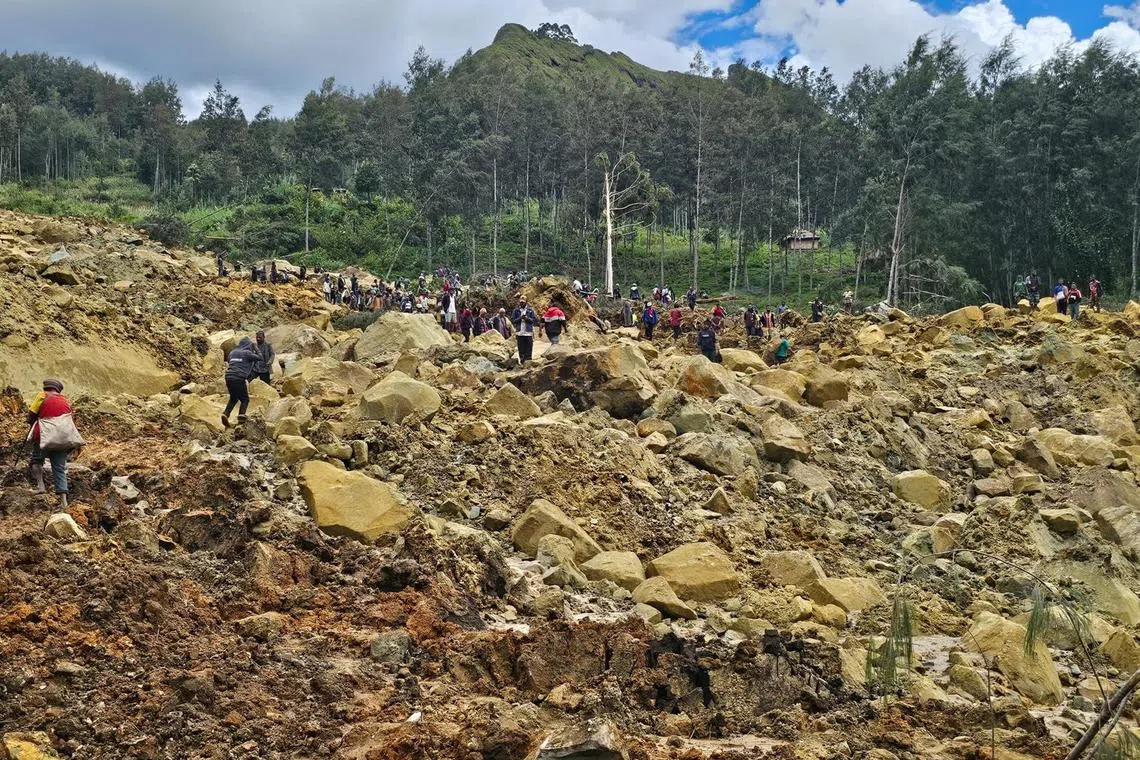 View of the damage after a landslide in Maip Mulitaka, Enga province, Papua New Guinea May 24, 2024 in this obtained image. Emmanuel Eralia via REUTERS THIS IMAGE HAS BEEN SUPPLIED BY A THIRD PARTY. MANDATORY CREDIT. NO RESALES. NO ARCHIVES.?