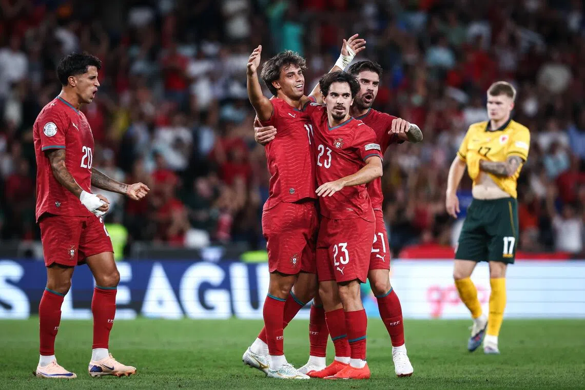 Joao Felix (second from left) celebrating with teammates after scoring for Portugal in their Sept 24 match against Wales in Lisbon.