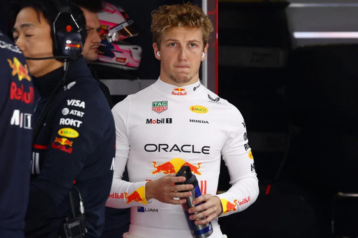 FILE PHOTO: Formula One F1 - Chinese Grand Prix - Shanghai International Circuit, Shanghai, China - March 21, 2025 Red Bull's Liam Lawson is seen ahead of the first practice session REUTERS/Edgar Su/File Photo
