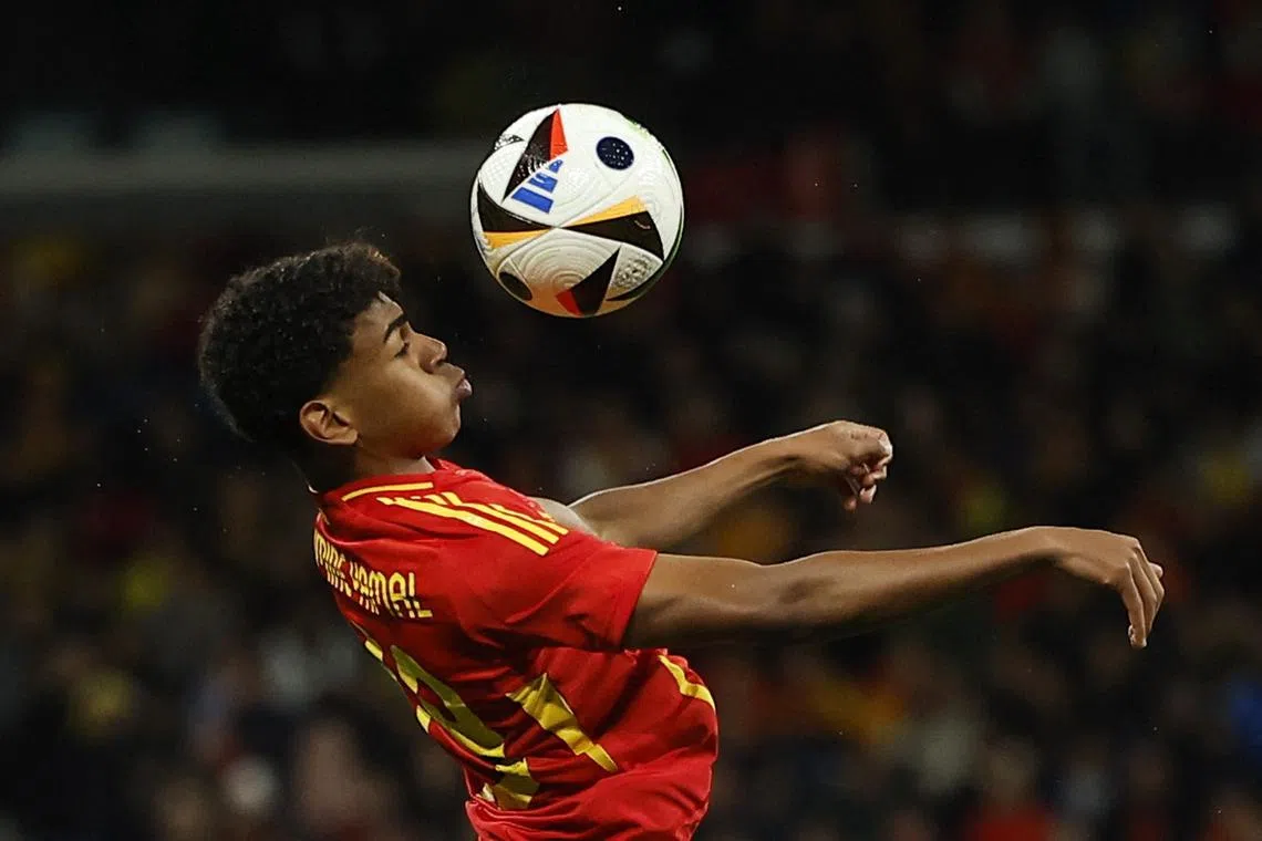 FILE PHOTO: Soccer Football - International Friendly - Spain v Brazil - Santiago Bernabeu, Madrid, Spain - March 26, 2024  Spain's Lamine Yamal in action REUTERS/Juan Medina/File Photo