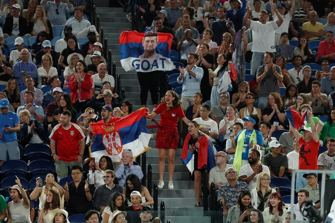 FILE PHOTO: File Photo: Tennis - Australian Open - Melbourne Park, Melbourne, Australia - January 31, 2026 Fans of Serbia's Novak Djokovic during his semi final match against Italy's Jannik Sinner REUTERS/Edgar Su/File Photo/File Photo