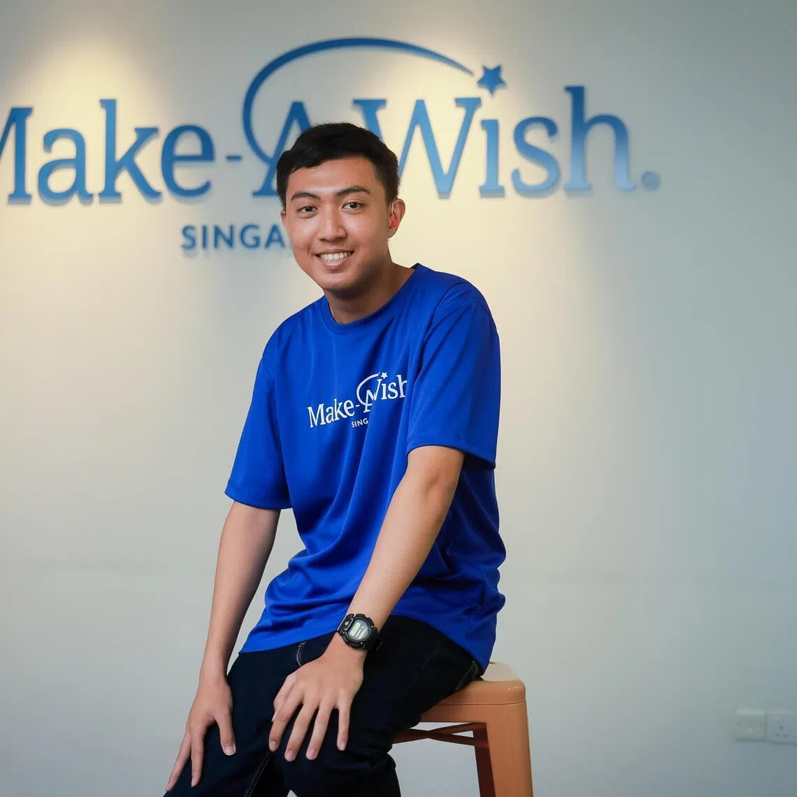 Isaac Ng, 18, an Information Technology student at Ngee Ann Polytechnic, at the Make-A-Wish office on Coleman Street on April 22, 2026. He lives with polyarticular juvenile idiopathic arthritis and meningoencephalitis, and recently had his wish fulfilled by Make-A-Wish, meeting the team behind Google Maps.
