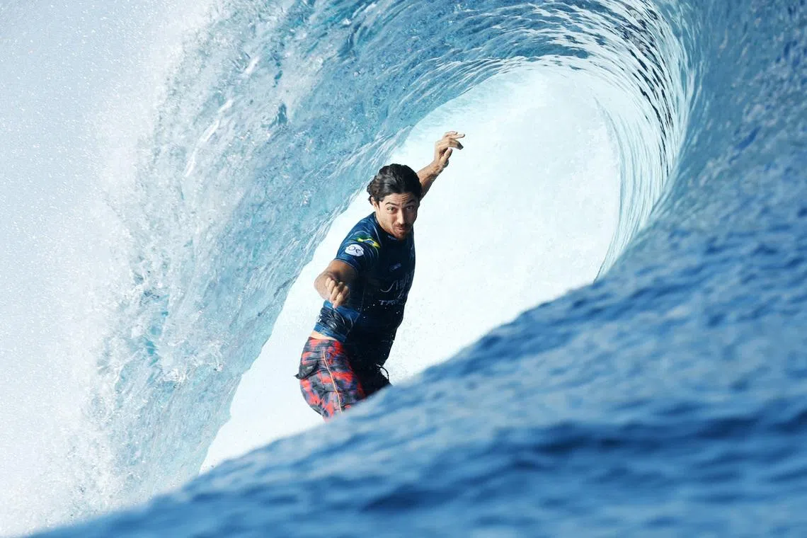 Surfing - World Surf League - Tahiti Pro - Teahupo'o, Tahiti, French Polynesia - May 30, 2024  Brazil's Yago Dora in action during the round of 16 heat 3 REUTERS/Thomas Bevilacqua